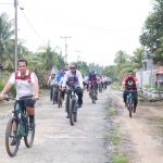 Polres Tulang Bawang Gelar Olahraga Sepeda Sekaligus Memberikan Bantuan Sosial